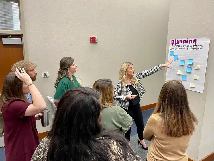 Breigh leading a planning session with a group of educators